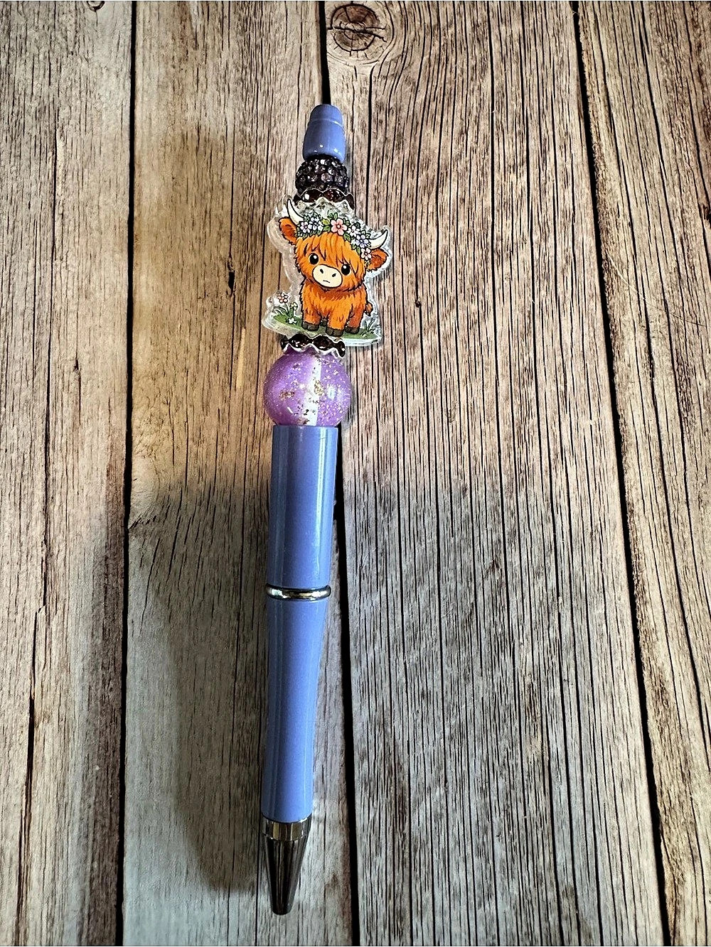 Purple highland cow pen